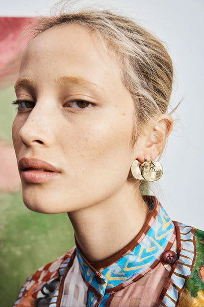 The Atomic Disc Mini Hoop Earrings